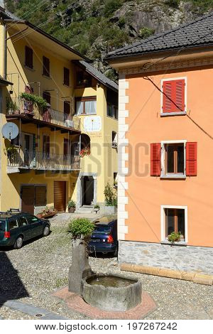 Giornico, Switzerland - 8 June 2015: Fountain and houses at Giornico on Leventina valley Switzerland