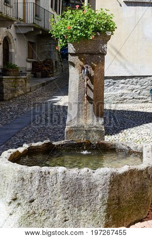 Fountain at Giornico on Leventina valley Switzerland