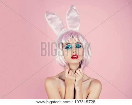 Girl With Bright Artificial Hair And Rabbit Ears.