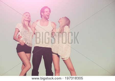 Man With Muscular Body With Twins.