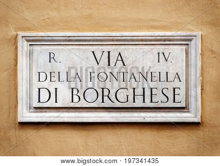 Via Della Fontanella Di Borghese Sign On Wall In Rome