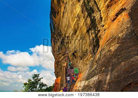 Sigiriya or Sinhagiri Lion Rock an ancient rock fortress located in the northern Matale District near the town of Dambulla in the Central Province Sri Lanka. Stairs and entrance to the rock