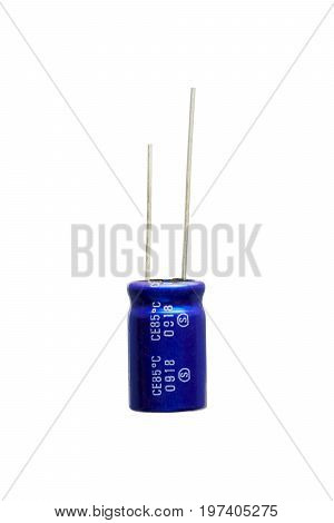 Blue electrolytic capacitor Isolated on white background Electronics part concept.
