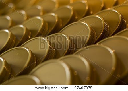 many jar lid caps row for jam honey abstract background bokeh