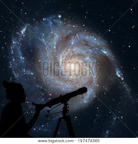 Girl Looking At The Stars With Telescope. Pinwheel Galaxy Messie