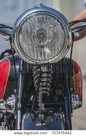 Reflector with glass in an old vintage motorcycle