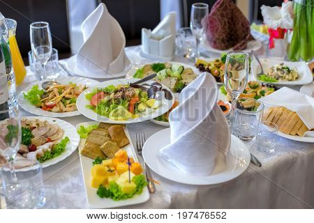 Banquet, wedding table, meal at the wedding, reception, table decor, decor of food