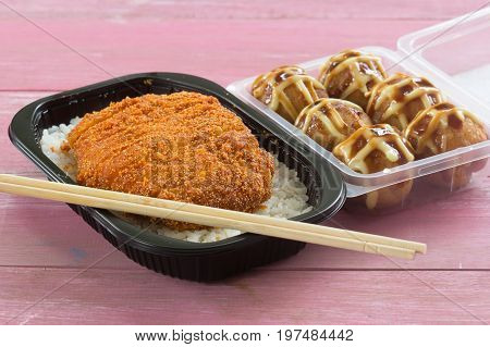 fried pork topped on rice (tonkatsu) and Tako Yaki on Box Japanese food