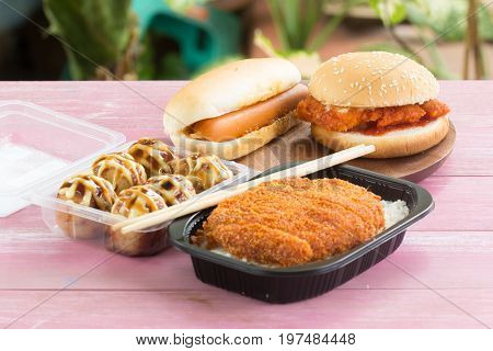 Fast food set / Fried pork topped on rice (tonkatsu) Tako Yaki Chicken burger and Hotdog