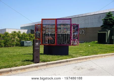 SOUTH HOLLAND, ILLINOIS / UNITED STATES - MAY 22, 2017: Dunkin' Donuts offers a drive-thru service at the Illinois Tollway's Chicago Southland Lincoln Oasis.