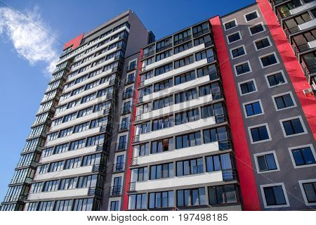 Apartment Building On Blue Sky Background