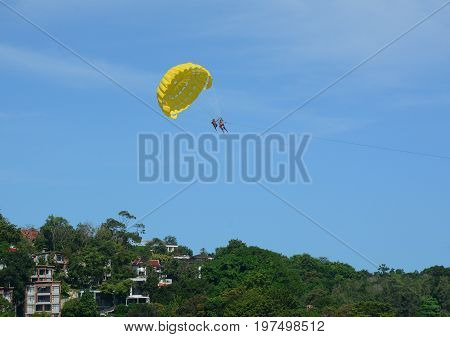 Playing Parasailing In Phuket, Thailand