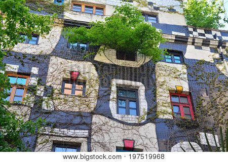 Vienna Austria - April 27 2015: Facade detail of the famous Hundertwasserhaus in Vienna Austria. Shot taken on April 27th 2015