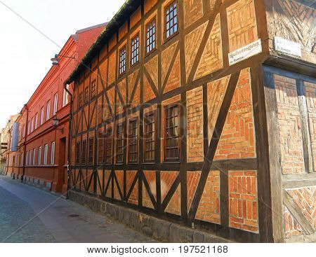 Impressive bricked half-timbered houses at the Lilla torg or Little square of Malmo, Sweden