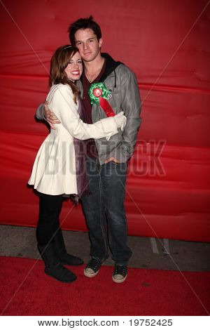 LOS ANGELES - NOV 28:  Molly Burnett, Mark Hapka arrive at the 2010 Hollywood Christmas Parade at Hollywood Boulevard on November 28, 2010 in Los Angeles, CA