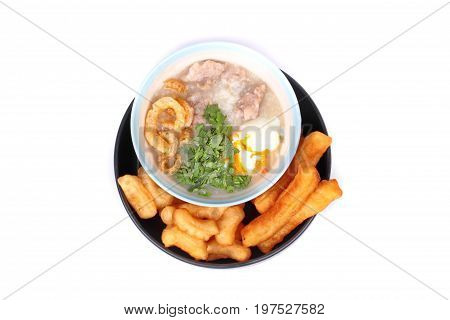 Pork's Rice Porridge Served With Deep-fried Dough Stick.