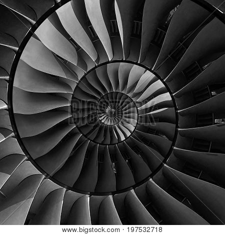 Turbine blades wings spiral effect abstract fractal pattern background. Spiral industrial production metallic turbine background. Turbine manufacturing technology abstract fractal pattern staircase