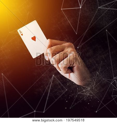 Hand holding ace of hearts card mixed media