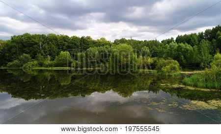The reservoir in the middle zone of Russia in the summer. Landscape.