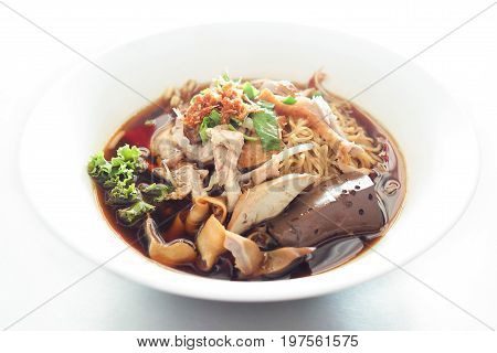 Noodle soup stewed duck put the blood and animal offal. Thailand food Chinese style.