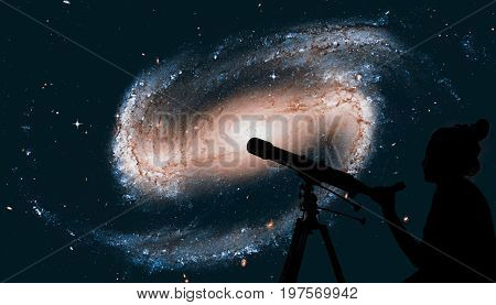 Girl Looking At The Stars With Telescope. Spiral Galaxy In The Constellation Eridanus Ngc 1300 .elem