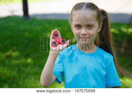 Girl Holding Popular Fidget Spinner Toy