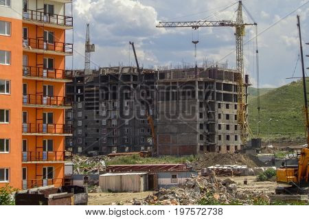 Buildings under construction, standard-type apartment buildings, Central Asia