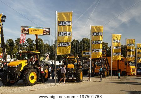 Munich, Germany - September 24, 2016: Agricultural machinery on the Theresienwiese during the Bavarian Agricultural Fair with unidentified people walking by the fair was in parallel during Oktoberfest