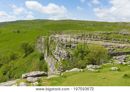 Malham Cove Yorkshire Dales National Park UK the rocky top of the cliff at the popular tourist attraction