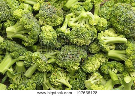 Heap of fresh and ripe broccoli background