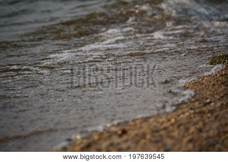 Wave rolling on the sandy shore of the Black Sea, Southern Ukraine