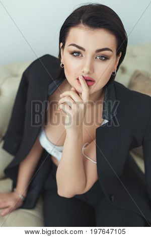Portrait of a cute woman with makeup on her face close-up.