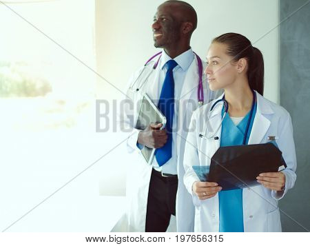 Doctors analyzing an x-ray in a meting. Doctors
