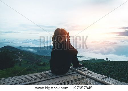 Asian women travel sleep relax. Morning atmosphere nature Forests mountains. Phu Thap Buek Thailand