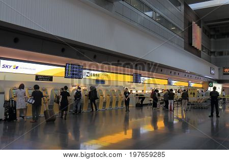 TOKYO JAPAN - JULY 11, 2017: Unidentified people check in at Skymark Airline counter.