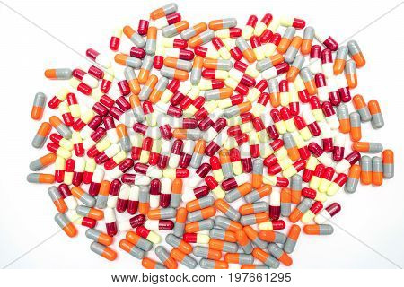 Colorful of antibiotic capsules pills on white background drug resistance