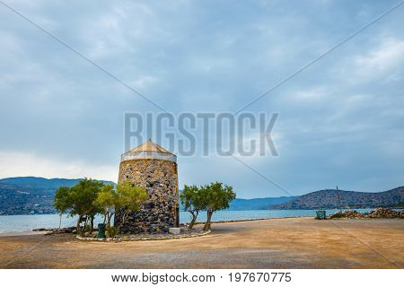 Ancient Windmill On Kalydon Peninsula Near Agios Nikolaos, Crete, Greece