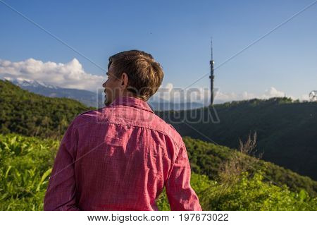 Young Man In Pink Shirt From Back Enjoying Beautiful Mountain View, Almaty, Kok Tobe
