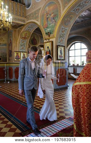 Alchevsk, Ukraine - April 28, 2017: Wedding Ceremony For Newlyweds In The Church