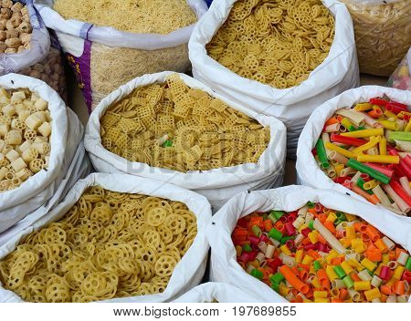 Selling Nuts And Dried Fruits At A Bazaar In India