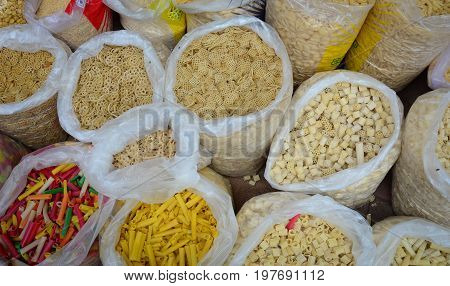 Selling Nuts And Dried Fruits At A Bazaar In India