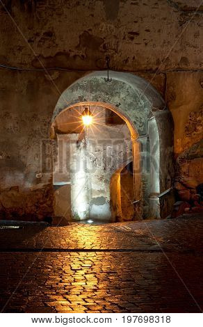 Medieval passage at night illuminated in Sighisoara