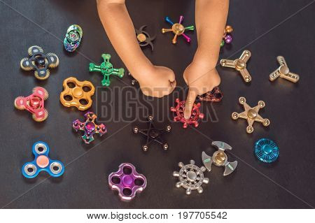 A Lot Of Different Spinners On A Black Background