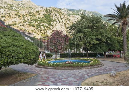 KOTOR MONTENEGRO - JUNE 30 2017: Beautiful park near the old town of Kotor always attract tourists