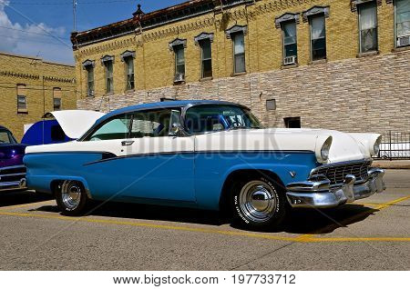 CASSELTON, NORTH DAKOTA, July 27, 2017: The annual Casselton Car Show which occurs the last Thursday of July features classic vehicles such as the 1955 two door Ford.