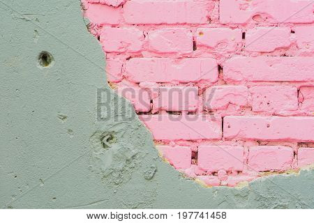 Abstract beautiful wall of grey cement and pink bricks. Rough damaged shabby texture with cracked. With place for your text, for background use