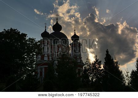 Monastery in Moldova. Orthodox Church at sunset