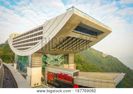 HONG KONG, CHINA - JANUARY 22, 2017: View of the Peak Tower in Hong Kong a top Victoria Peak. At 428 meters above sea level, this iconic landmark features the highest viewing platform in Hong Kong.
