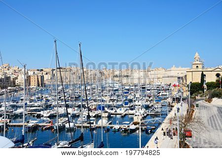 VITTORIOSA, MALTA - MARCH 31, 2017 - Elevated view of Vittoriosa waterfront and marina with views towards Senglea and Valletta Vittoriosa (Birgu) Malta Europe, March 31, 2017.