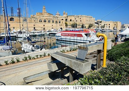 VITTORIOSA, MALTA - MARCH 31, 2017 - Elevated view of Vittoriosa marina with views towards Senglea Vittoriosa (Birgu) Malta Europe, March 31, 2017.
